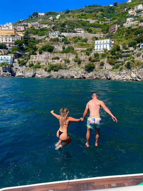 Capri: Boat Tour Around Capri With Faraglioni and Grottos - Explore Capris Coastal Beauty